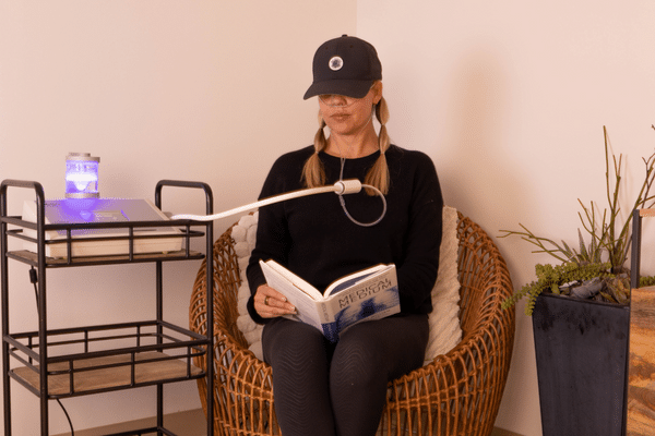 NanoVi Young lady receiving NanoVi therapy at Ascent Adaptation and Regeneration